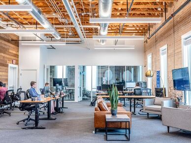 A co-working office setting with professionals 